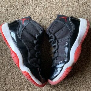 Jordan 11 Bred Size 5.5Y/ Men’s 5.5Y/ Women’s 7